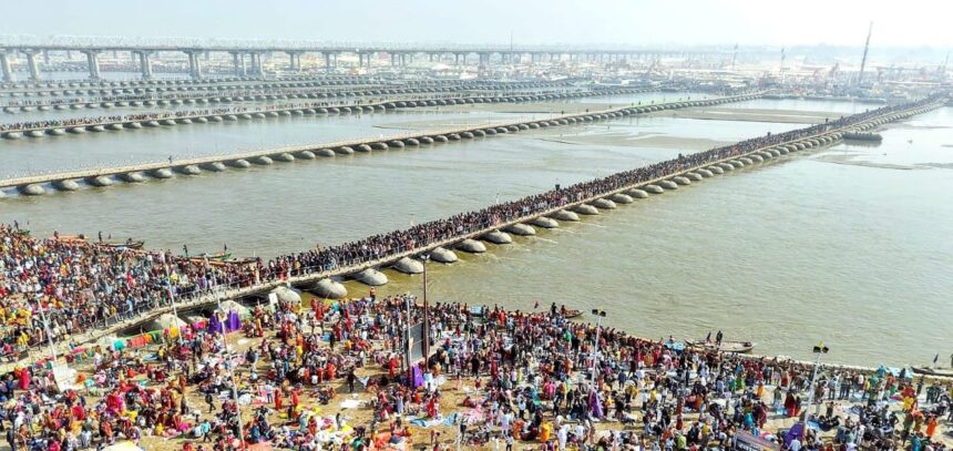 Kumbh Mela, Triveni Sangam, Prayagraj, Hindu festival, religious gathering, pontoon bridges, aerial view, river confluence, mass pilgrimage, cultural heritage, Mahakumbha 2025